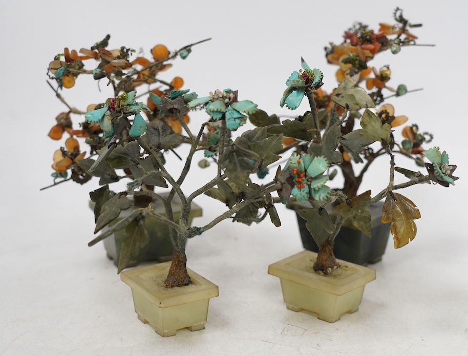 Two pairs of Chinese jade and hardstone mounted models of trees, tallest 16cm. Condition - fair, some losses